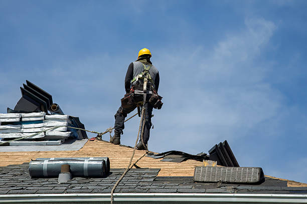 Professional Roof Replacement technician working in Sun River, MT